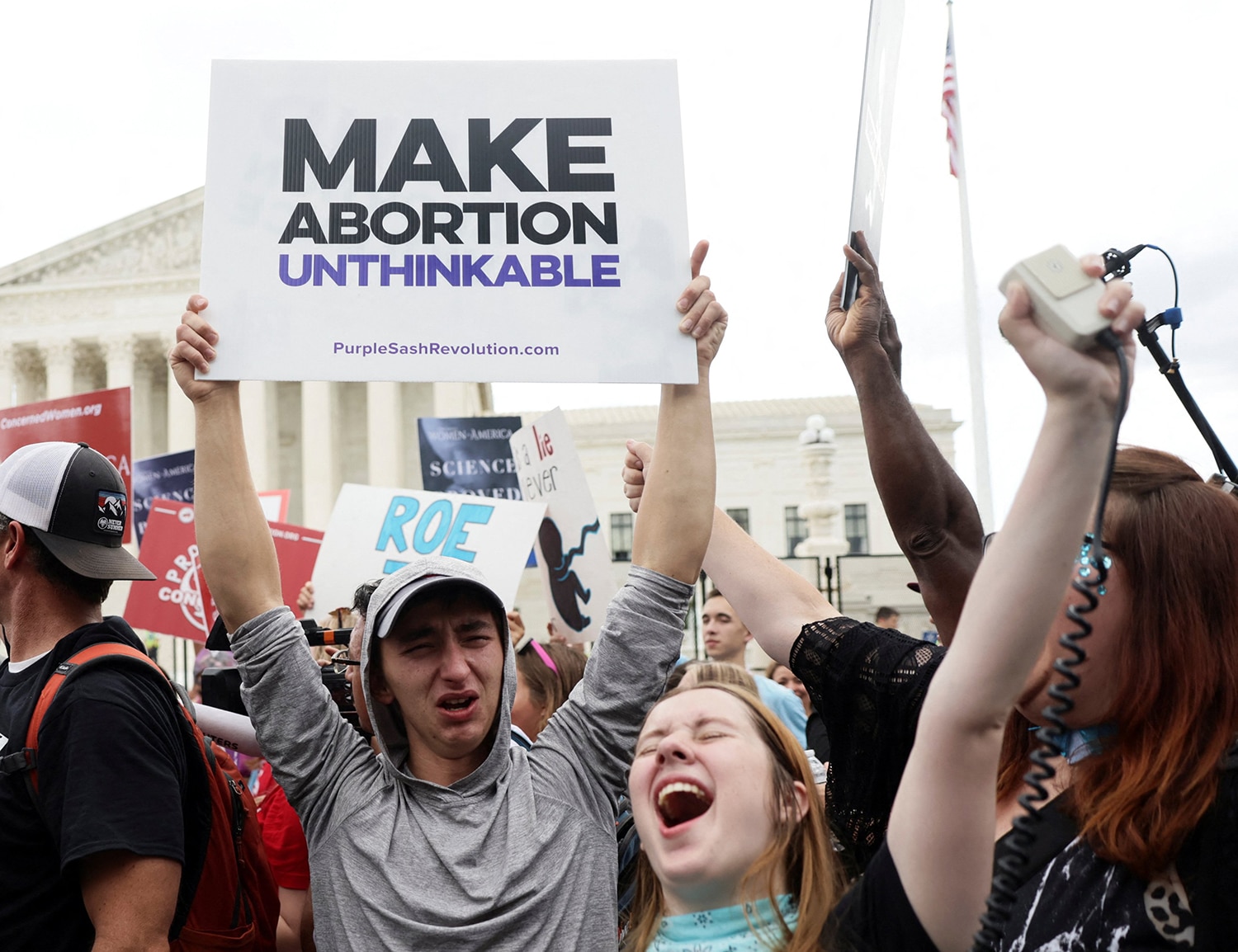 Pro-life demonstrators in Washington celebrate outside the Supreme Court June 24, 2022, as the court overruled the landmark Roe v. Wade abortion decision.