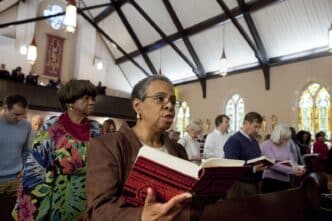 WOMAN SINGS HYMN VIRGINIA CHURCH